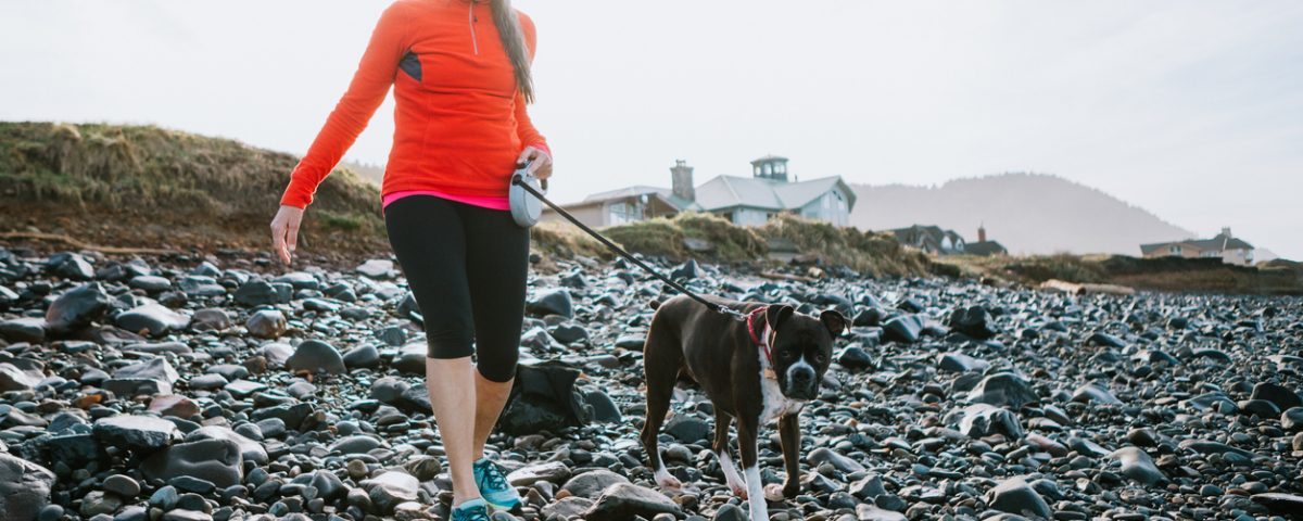 Woman Exercising with Dog